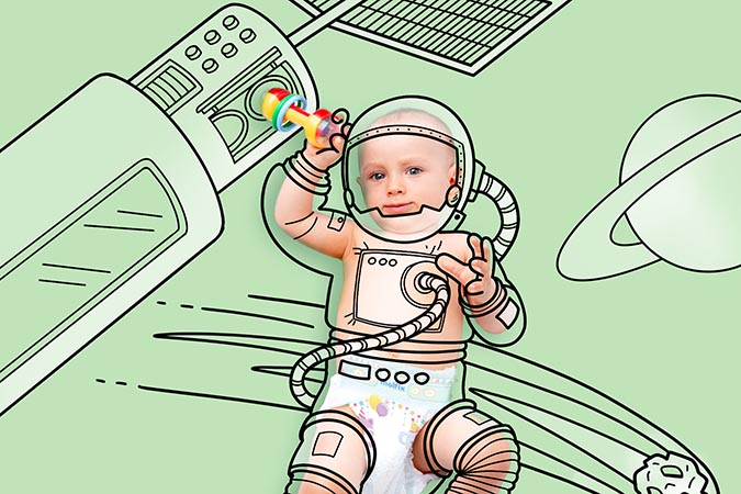 A baby astronaut out in space wearing Molfix diapers